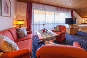 Posezení v ubytování Hotel Alpina