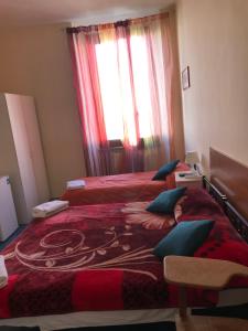 Postel nebo postele na pokoji v ubytování B&B Cappellini s.n.c.