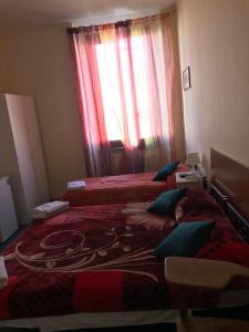Postel nebo postele na pokoji v ubytování B&B Cappellini s.n.c. + 6 fotografií