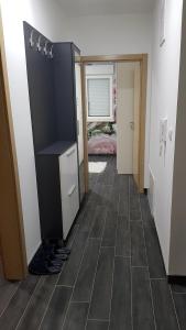 Ένα ή περισσότερα κρεβάτια σε δωμάτιο στο Apartman Karma +24 φωτογραφίες