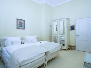 Säng eller sängar i ett rum på Royal Apartment City Center Baden-Baden