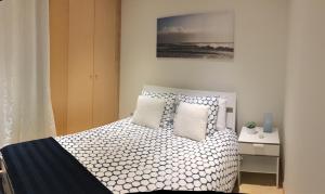 A bed or beds in a room at NEW APT center 1 min walk beach/river/casino!!!