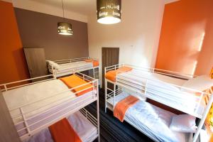 Postel nebo postele na pokoji v ubytování Planet Hostel