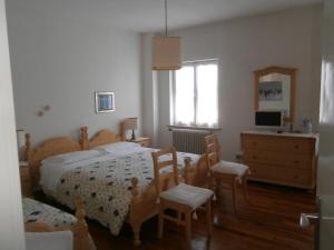 Postel nebo postele na pokoji v ubytování Hotel Due Pini + 24 fotografií