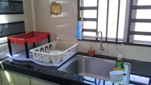 A kitchen or kitchenette at Airis Homestay Changlun