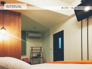Uma cama ou camas num quarto em Interval