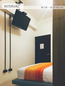 Uma cama ou camas num quarto em Interval