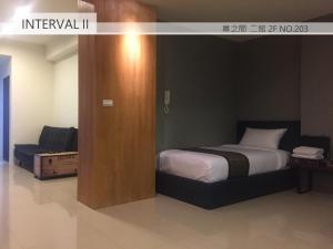 Uma cama ou camas num quarto em Interval