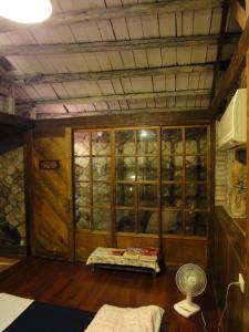 Postel nebo postele na pokoji v ubytování Jiufen Aromatherapy B&B