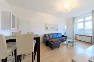 Χώρος καθιστικού στο Apartment Traveblick