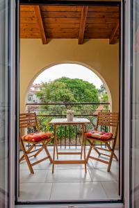 En balkon eller terrasse på Apartments & Rooms Chiara