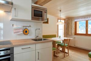 Küche/Küchenzeile in der Unterkunft Haus Wasserfall