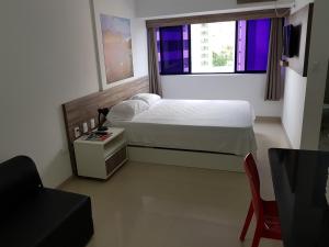 Postel nebo postele na pokoji v ubytování Studio Everest Flats