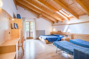 Posezení v ubytování Al Pian Garnì Hotel - B&B & Pizza