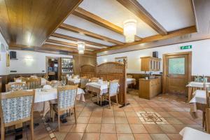 Restaurace v ubytování Al Pian Garnì Hotel - B&B & Pizza