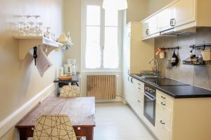 Η κουζίνα ή μικρή κουζίνα στο Appartement Passe Partout