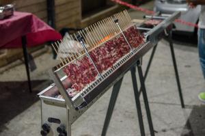 a grill with meat on top of a table at Holiday in Magliano deʼ Marsi
