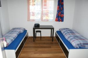 Ένα ή περισσότερα κρεβάτια σε δωμάτιο στο Blumenau