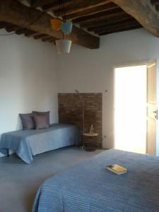 Posteľ alebo postele v izbe v ubytovaní Zucchero sui Baffi- Food Lovers B&B