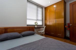 Postel nebo postele na pokoji v ubytování Sky Center Hostel