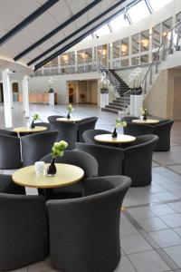 Area soggiorno di Fletcher Hotel - Resort Spaarnwoude