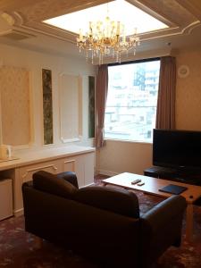 Posezení v ubytování Royal Hotel Shinokubo