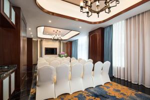 TV a/nebo společenská místnost v ubytování Overseas Chinese Hotel Wenzhou