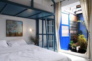 Postel nebo postele na pokoji v ubytování Aekkeko hostel + 37 fotografií