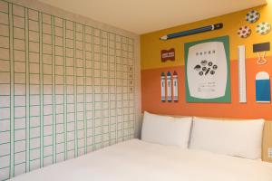 Katil atau katil-katil dalam bilik di Morwing Hotel - Culture Vogue
