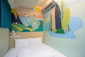 Katil atau katil-katil dalam bilik di Morwing Hotel - Culture Vogue