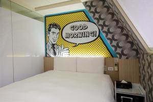 Katil atau katil-katil dalam bilik di Morwing Hotel - Culture Vogue