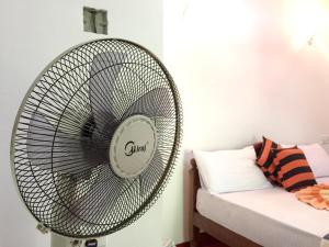 Postel nebo postele na pokoji v ubytování Aroma Heaven Homestay