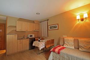 Kuchyň nebo kuchyňský kout v ubytování Hotel-Aparthotel El Reyno