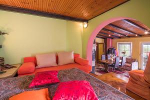 a living room with a couch and a table at Lucy in Krk