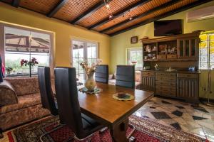 a living room with a table and a couch at Lucy in Krk