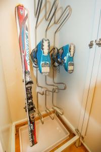 a pair of skis are hanging on a wall at Casa Rosalba in Livigno