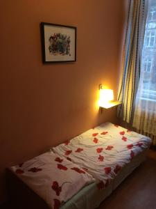 Postel nebo postele na pokoji v ubytování U Szermierzy