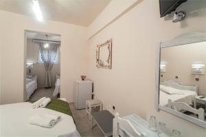 Letto o letti in una camera di Amaryllis Hotel