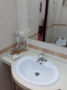 Koupelna v ubytování Hotel Botakoz