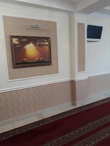 TV a/nebo společenská místnost v ubytování Hotel Botakoz