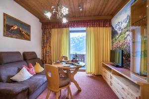 TV a/nebo společenská místnost v ubytování Aparthotel Gallahaus