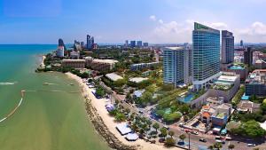 an aerial view of a city with a beach and buildings at View Talay 1B Residence in Pattaya South