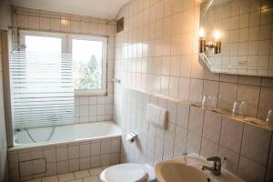 Koupelna v ubytování Hotel Stadt Peine