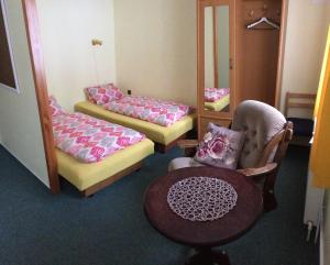 Postel nebo postele na pokoji v ubytování U Kapličky