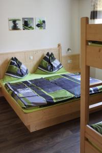 A bed or beds in a room at Appartement Höll
