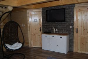 A television and/or entertainment centre at Chata Nezábudka