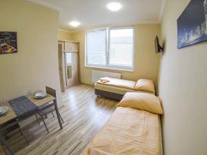 Posedenie v ubytovaní Apartmány ORAVA-EDDA