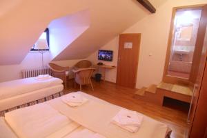 Posteľ alebo postele v izbe v ubytovaní Hotel Klika