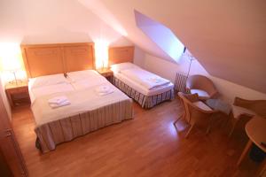 Posteľ alebo postele v izbe v ubytovaní Hotel Klika