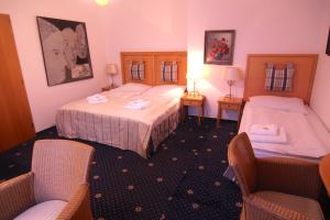 Posteľ alebo postele v izbe v ubytovaní Hotel Klika